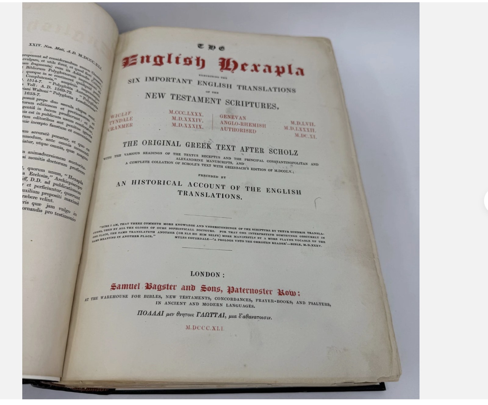 Leather-bound 1841 English Hexapla (Samuel Bagster and Sons, London) open to its title page — dated imprint M.DCCC.XLI, red and black lettering, the kind of pre-1900 antique we evaluate regularly.